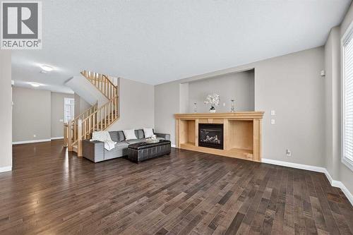 93 Silverado Bank Circle Sw, Calgary, AB - Indoor Photo Showing Living Room With Fireplace