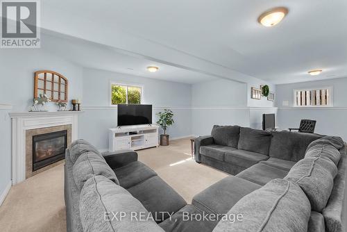 8 Lindan Street, West Lincoln (Smithville), ON - Indoor Photo Showing Living Room With Fireplace