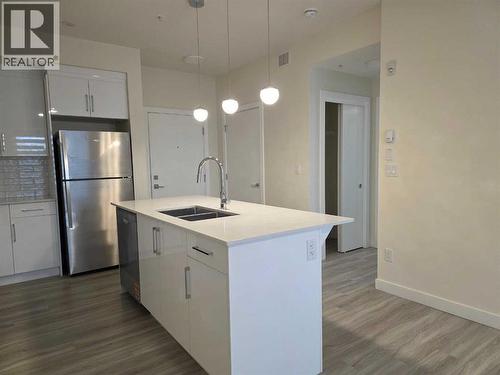2220, 15 Skyview Point Crescent, Calgary, AB - Indoor Photo Showing Kitchen With Stainless Steel Kitchen With Double Sink With Upgraded Kitchen