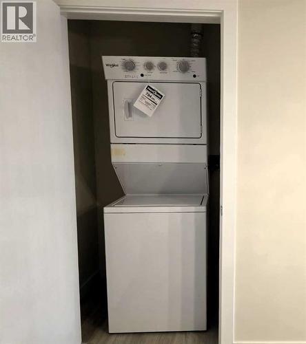 2220, 15 Skyview Point Crescent, Calgary, AB - Indoor Photo Showing Laundry Room
