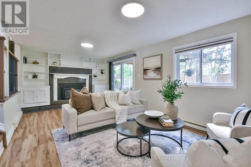 49 Ridgeway Avenue, Barrie, ON - Indoor Photo Showing Living Room With Fireplace
