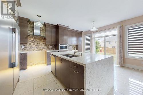 61 Mcisaac Drive, Springwater, ON - Indoor Photo Showing Kitchen With Double Sink With Upgraded Kitchen