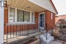 Entrance to property featuring brick siding and covered porch - 120 Fourth Avenue, Kitchener, ON  - Outdoor With Deck Patio Veranda 