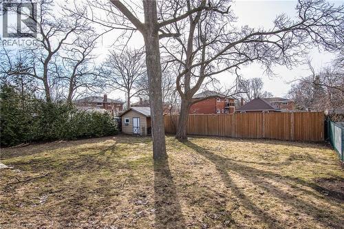 Fenced backyard with an outbuilding - 120 Fourth Avenue, Kitchener, ON - Outdoor
