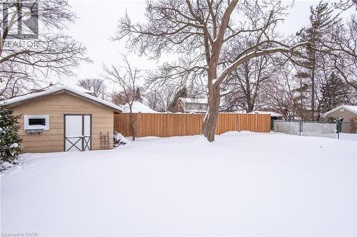 Snowy yard featuring an outdoor structure - 120 Fourth Avenue, Kitchener, ON - Outdoor