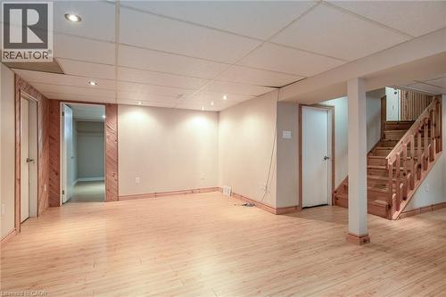 Finished below grade area with a drop ceiling, light wood-style flooring, and recessed lighting - 120 Fourth Avenue, Kitchener, ON - Indoor