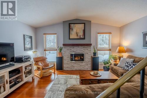 118 Seabrooke Drive, Ottawa, ON - Indoor Photo Showing Living Room With Fireplace