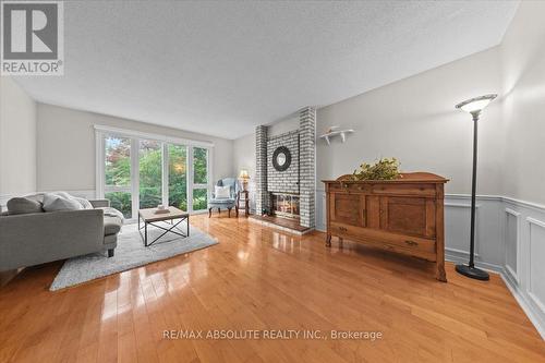 22 Banting Crescent, Ottawa, ON - Indoor Photo Showing Living Room With Fireplace