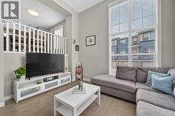 Spacious living area with modern finishes - 