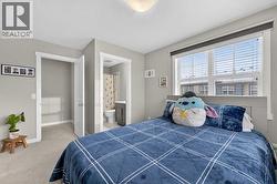 Second bedroom with its en-suite bath and walk -in-closet - 