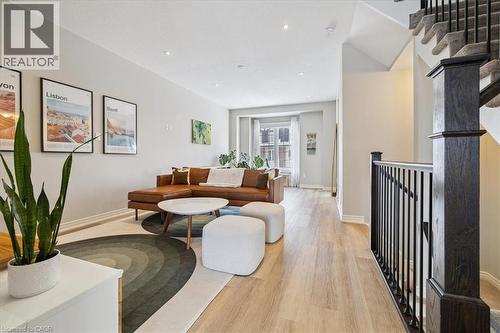 Living room featuring light wood-type flooring and recessed lighting - 2220 Queensway Drive Unit# 15, Burlington, ON - Indoor