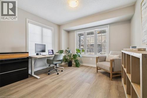 Office with light wood finished floors and a textured ceiling - 2220 Queensway Drive Unit# 15, Burlington, ON - Indoor Photo Showing Office