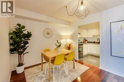 Dining area featuring light wood-style flooring - 
