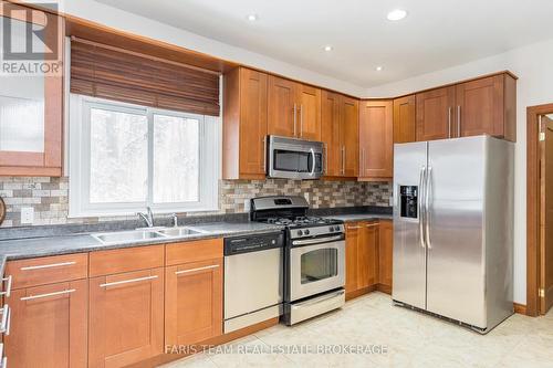 2384 Champlain Road, Tiny, ON - Indoor Photo Showing Kitchen With Double Sink