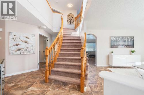 25 Cranwell Place Se, Calgary, AB - Indoor Photo Showing Living Room With Fireplace