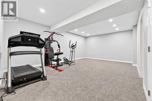 37 Evansfield Manor Nw, Calgary, AB - Indoor Photo Showing Gym Room
