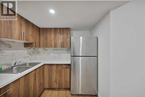 67 Copperstone Circle Se, Calgary, AB - Indoor Photo Showing Kitchen With Double Sink