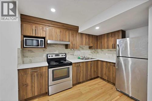 67 Copperstone Circle Se, Calgary, AB - Indoor Photo Showing Kitchen With Stainless Steel Kitchen With Double Sink