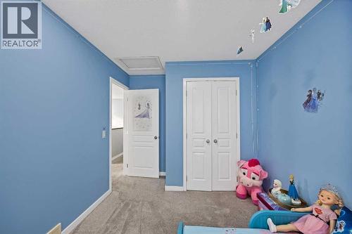 67 Copperstone Circle Se, Calgary, AB - Indoor Photo Showing Other Room