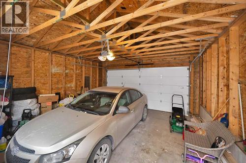 67 Copperstone Circle Se, Calgary, AB - Indoor Photo Showing Garage