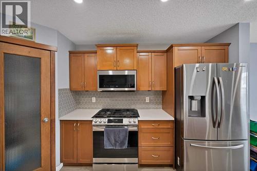 67 Copperstone Circle Se, Calgary, AB - Indoor Photo Showing Kitchen With Stainless Steel Kitchen