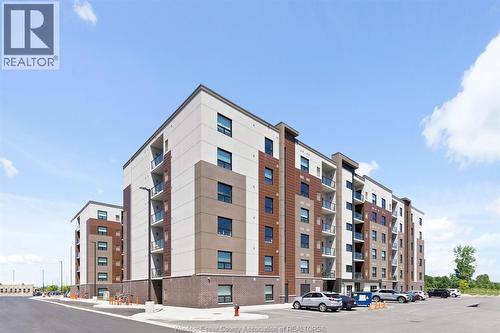 728 Brownstone Drive Unit# 201, Tecumseh, ON - Outdoor With Facade