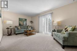 XL living room w/patio doors leading to backyard - 