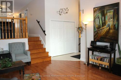Living room with double closets towards side door - 1791 Cumberland Street, Cornwall, ON - Indoor Photo Showing Other Room