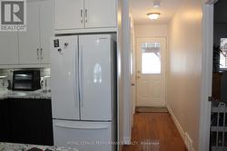Kitchen to back door and deck - 