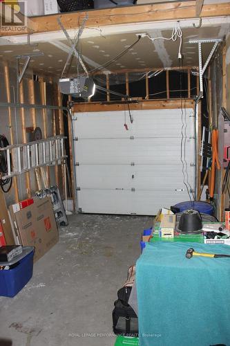 Single garage - 1791 Cumberland Street, Cornwall, ON - Indoor Photo Showing Garage