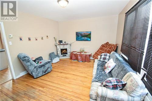 7 Sixth Ave, Levack, ON - Indoor Photo Showing Living Room With Fireplace