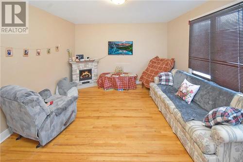 7 Sixth Ave, Levack, ON - Indoor Photo Showing Living Room With Fireplace