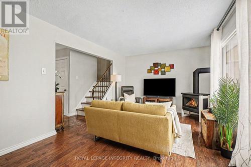 61 - 2003 Falkirk Crescent, Ottawa, ON - Indoor Photo Showing Living Room With Fireplace
