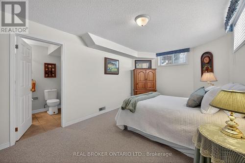 Lower level Bedroom with closet and semi ensuite - 9 Riverdale Drive, Wasaga Beach, ON - Indoor Photo Showing Bedroom