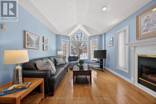 Loads of natural light & cozy fireplace - 9 Riverdale Drive, Wasaga Beach, ON - Indoor Photo Showing Living Room With Fireplace