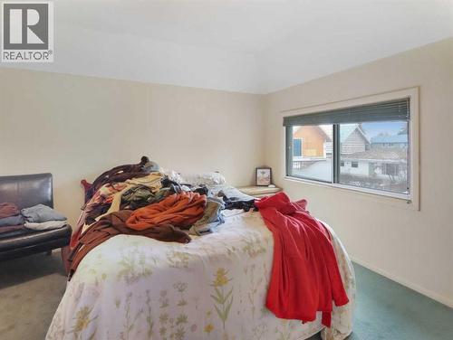 910 Main Street, Canmore, AB - Indoor Photo Showing Bedroom