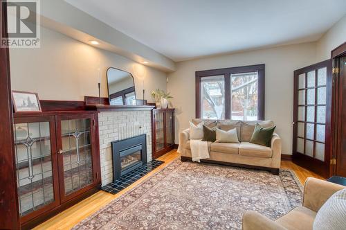 64 Fulton Avenue, Ottawa, ON - Indoor Photo Showing Living Room With Fireplace
