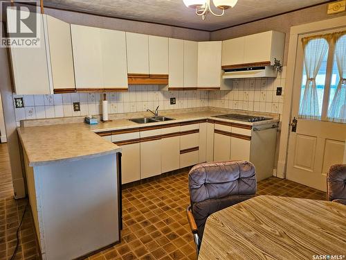 404 Brownlee Street, Herbert, SK - Indoor Photo Showing Kitchen With Double Sink