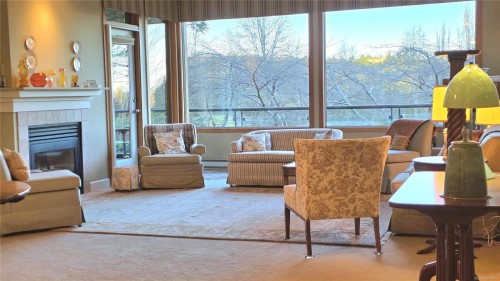 108-5329 Cordova Bay Rd, Saanich, BC - Indoor Photo Showing Living Room With Fireplace