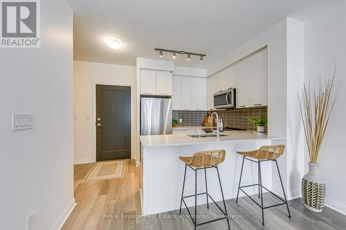 1416 - 5033 Four Springs Avenue, Mississauga, ON - Indoor Photo Showing Kitchen With Stainless Steel Kitchen With Double Sink With Upgraded Kitchen