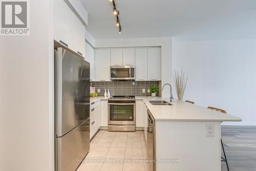 1416 - 5033 Four Springs Avenue, Mississauga, ON - Indoor Photo Showing Kitchen With Stainless Steel Kitchen With Double Sink