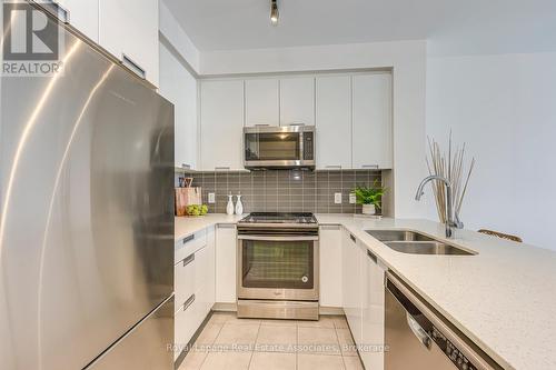 1416 - 5033 Four Springs Avenue, Mississauga, ON - Indoor Photo Showing Kitchen With Stainless Steel Kitchen With Double Sink With Upgraded Kitchen