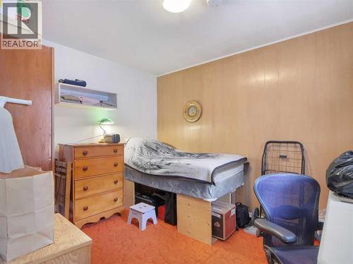 906 Main Street, Canmore, AB - Indoor Photo Showing Bedroom