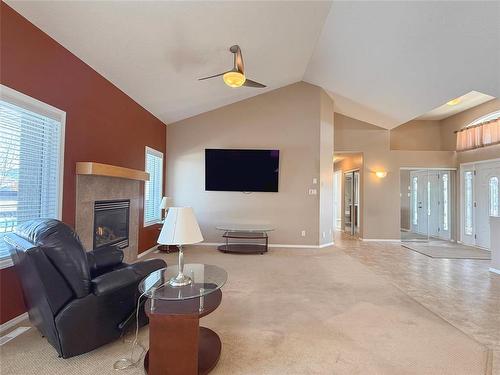19 Hawthorn Crescent, Brandon, MB - Indoor Photo Showing Living Room With Fireplace