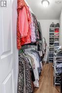 Large walk-in closet in primary bedroom - 