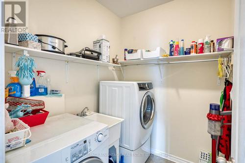 Handy separate M/FL laundry room w/convenient sink - 10 Antonio Way, Perth, ON - Indoor Photo Showing Laundry Room
