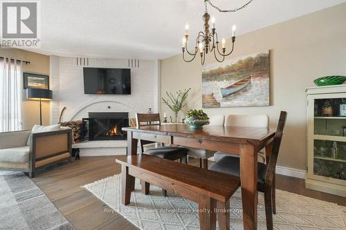 Dining Table - 2E - 20 Ryder Drive, Mcdougall, ON - Indoor Photo Showing Dining Room With Fireplace