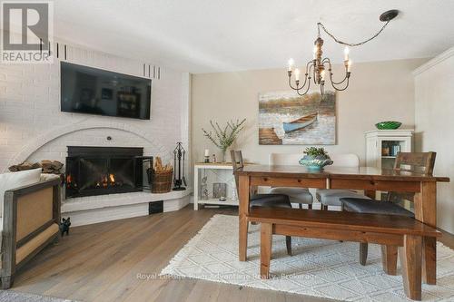 2E - 20 Ryder Drive, Mcdougall, ON - Indoor Photo Showing Dining Room With Fireplace
