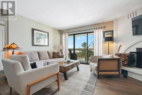 Living Room with Door to Balcony - 2E - 20 Ryder Drive, Mcdougall, ON - Indoor Photo Showing Living Room