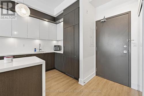 Contemporary Kitchen is Stylish and Functional - 111 - 1284 Guelph Line, Burlington, ON - Indoor Photo Showing Kitchen